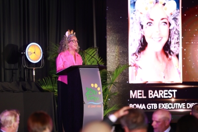 5 Mel with title screen.jpg